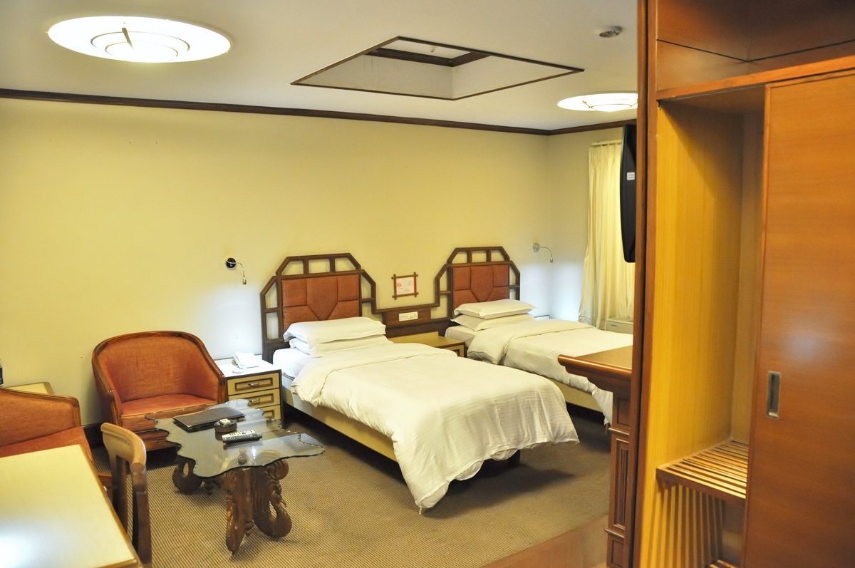 Deluxe Room at Hotel Aram Jamnagar — king or twin beds, 275 sq ft