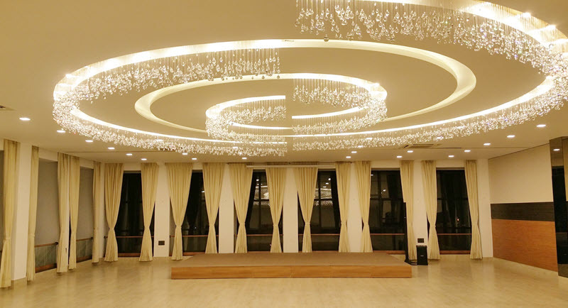 Spacious and elegant Sapphire Hall at Hotel Aram, set up for a grand event.